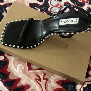 Steven madden heels in a size 10 black with crystal balls